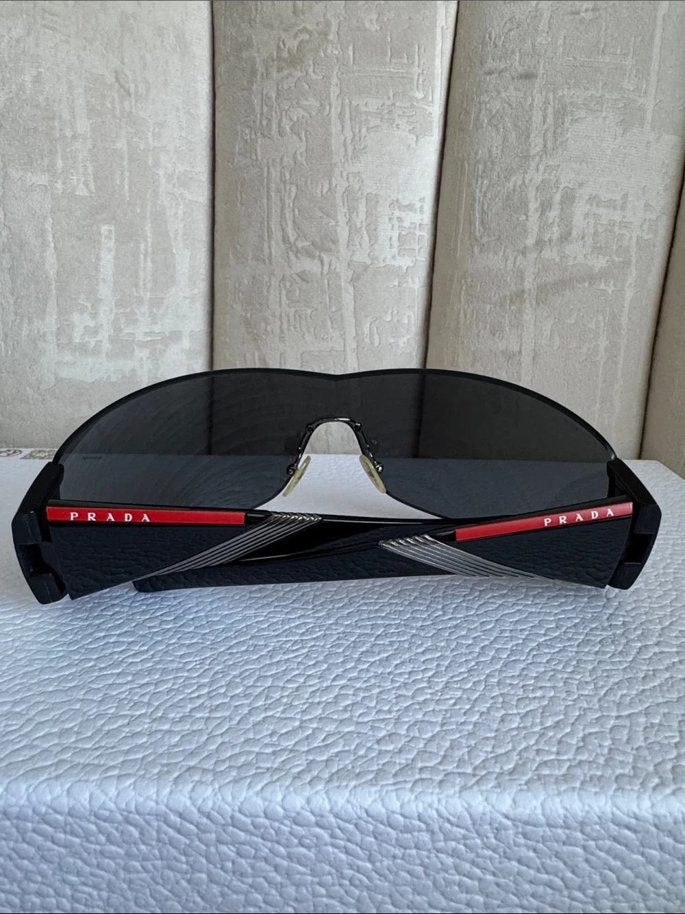 Prada Black Shield Sunglasses with Red Temple Accent